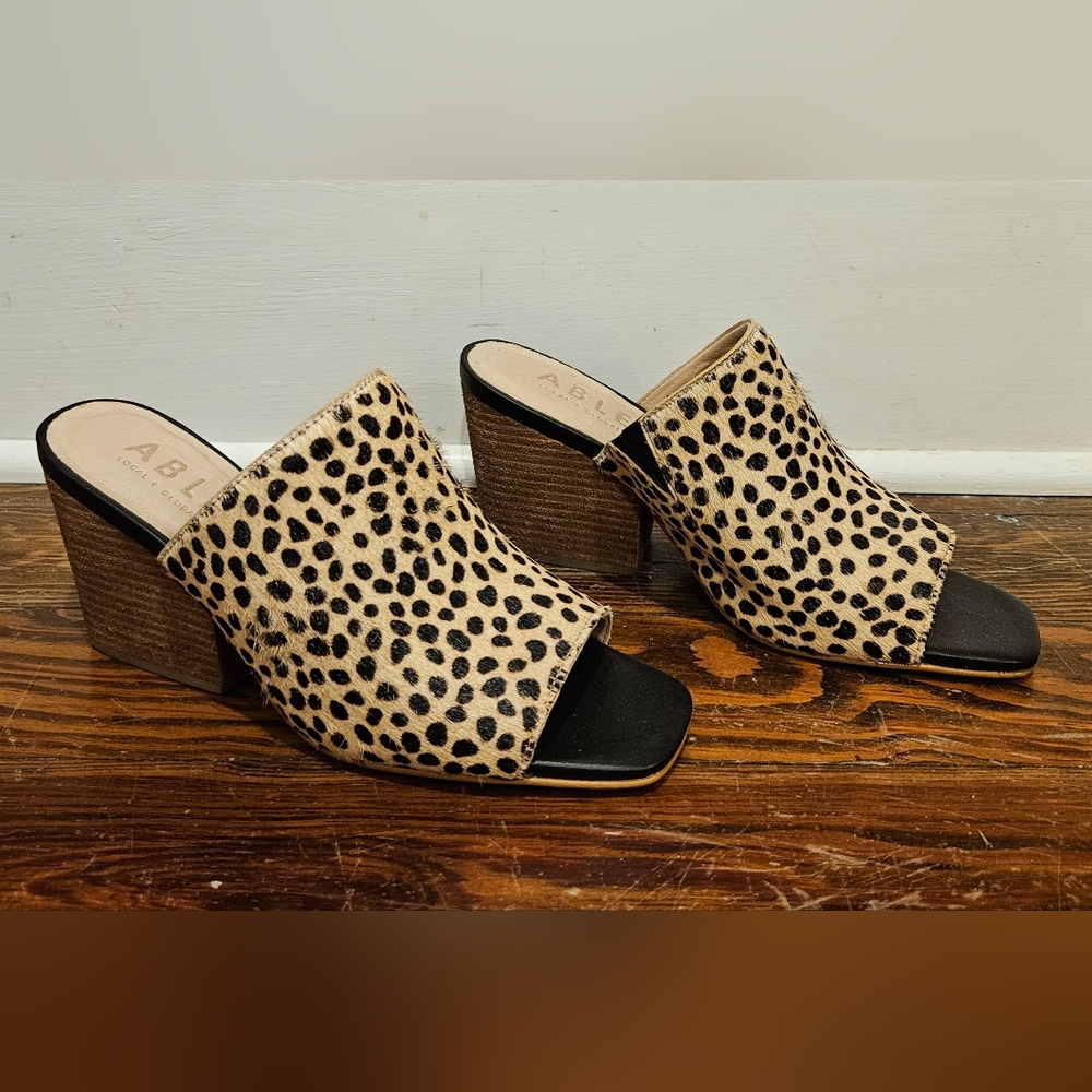 Able Black and Tan Leopard Sandals